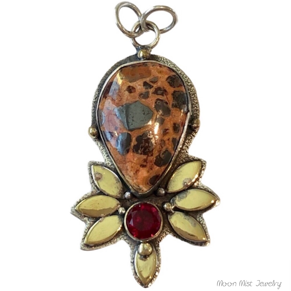 Bauxite and garnet pendant